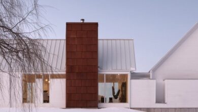 Photo of BLDG Workshop places steel details on all-white home in rural Ontario