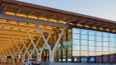 Photo of SOM tops Kansas City airport terminal with giant timber-clad canopy