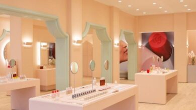 Photo of Glossier Boston store features pastel green mouldings