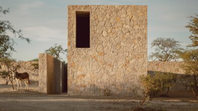 Photo of HW Studio divides a rural Mexican house with large stone walls