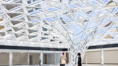 Photo of Studio Other Spaces museum courtyard in “canopy of glass and mirrors”