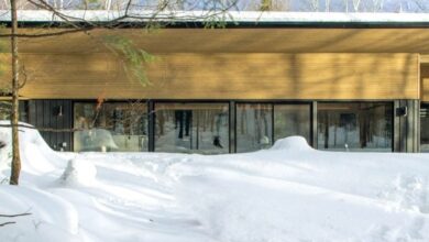 Photo of Stephane Gaulin-Brown places curved roof on Quebec chalet