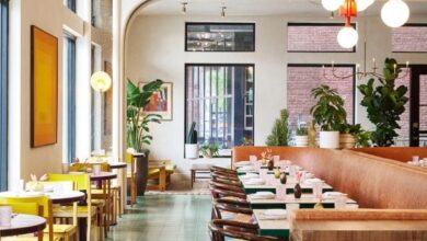 Photo of Hotel Genevieve in Louisville features colour-coordinated guest rooms