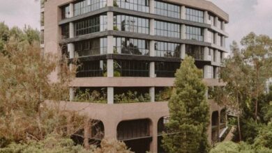 Photo of StudioSC and Base Taller create office building on a steep site in Colombia