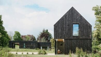 Photo of Loader Monteith adds charred-timber-clad office to brownfield site