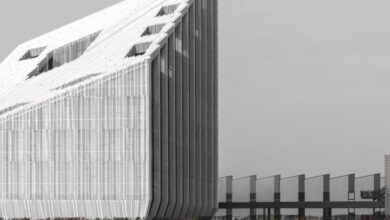 Photo of Peter Pichler encloses geometric office block with pleated facades