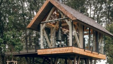 Photo of Jan Tyrpekl raises glass micro home on stilts in Austria