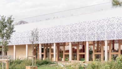 Photo of Atelier WOA creates long timber-framed library in France