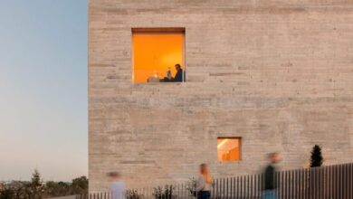 Photo of Spaceworkers frames views through deep reveals at Portuguese house